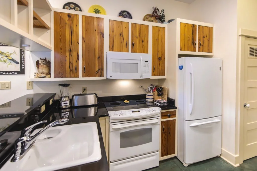 Flat 2 has a full kitchen with everything from a dishwasher to a full size fridge. Dishes are included