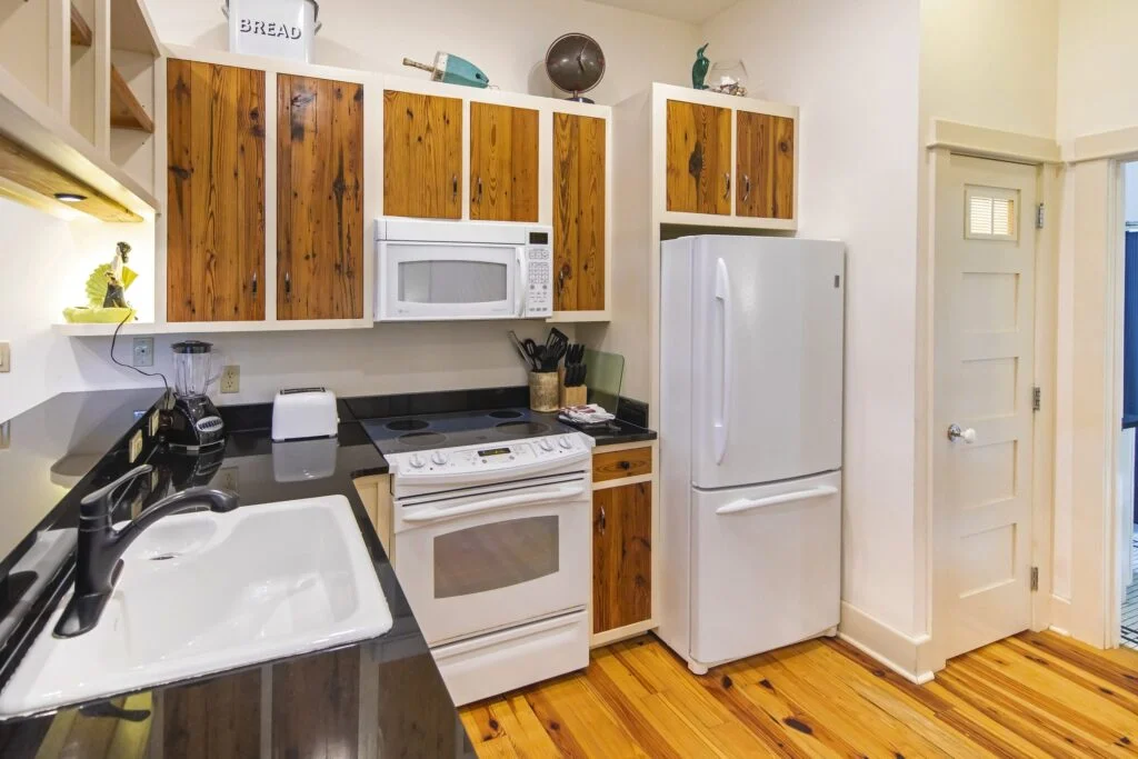 Flat 4 boasts a full kitchen, with a full stove top and oven, dishwasher, and full size fridge!