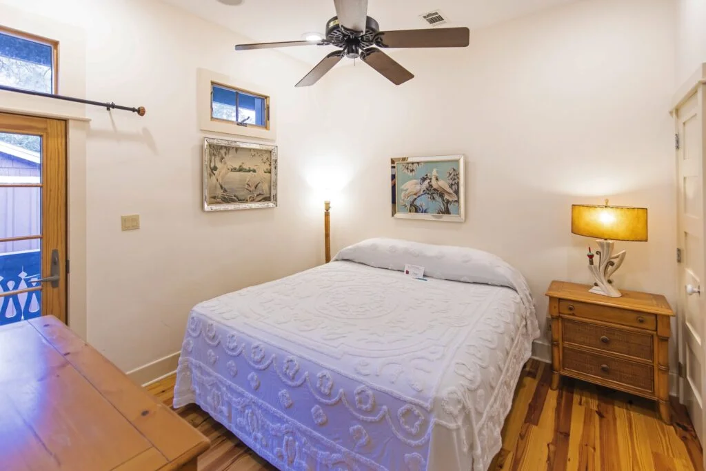 Flat 4s bedroom is a beautiful room, with a door leading to an outside sitting area.