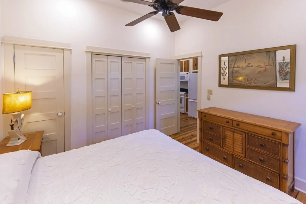 There is a closet in flat 4's bedroom, holding extra linens, sheets, and pillows for the pull out couch.