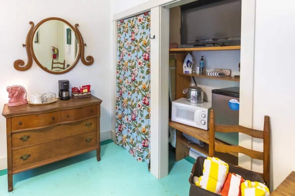 The Hibiscus Room beach towels, free coffee, microwave, tv, and ironing board.