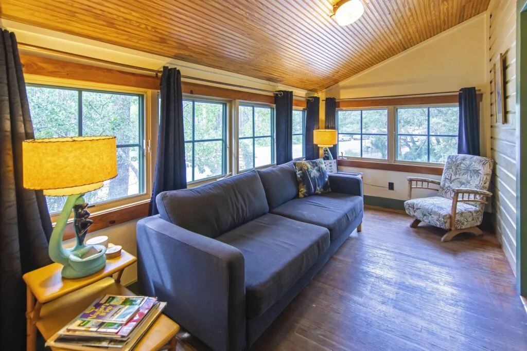 Romance Room has a den area with a pull out couch and lots of windows.