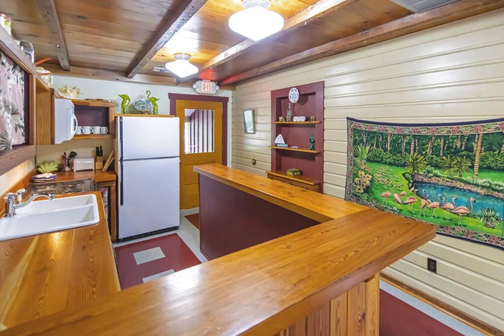 The shared kitchen area is a full sized kitchen with plenty of dishes for both rooms.