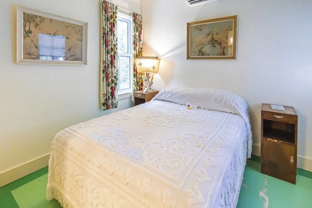 Turner has a queen sized bed and lots of bird old Florida themed art work!